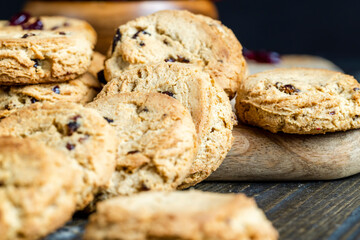 delicious dried cookies made of high-quality flour with dried red cranberries on the table