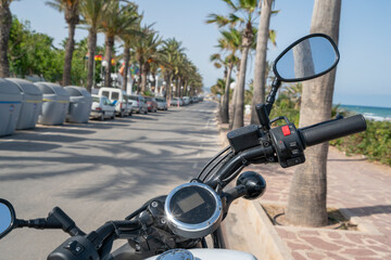 Travel motorcycle. Moto parked near sea side.
