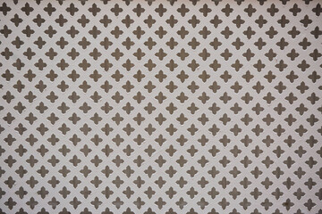 The texture of a metal mesh with holes. Use for fencing.