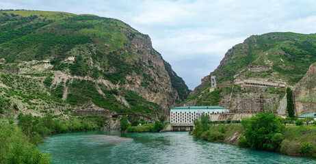Fototapeta na wymiar hydroelectric power plant in a mountain canyon