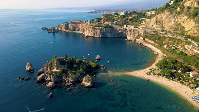 Taormina Sicily Isola Bella beach from the sky aerial view voer the Island and the beach by Taormina Sicily Italy. Europe