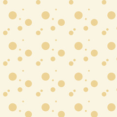 seamless pattern of dots on a beige background . vector illustration