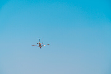 Jet in blue sky. Travel, air transportation concept