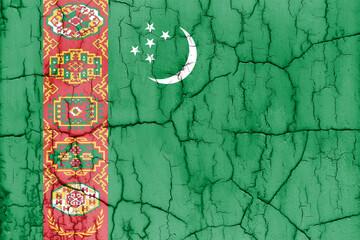 Textured photo of the flag of Turkmenistan with cracks.