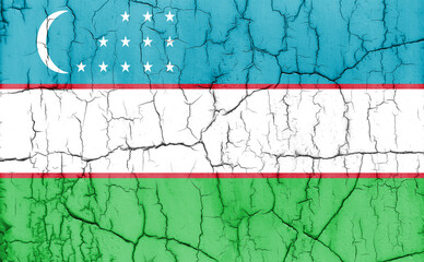 Textured photo of the flag of Uzbekistan with cracks.