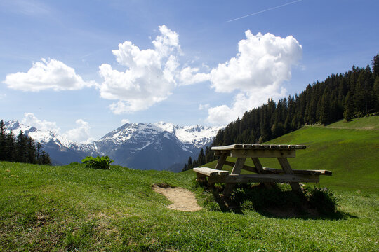 Green grass alpine valley mountain panorama view of  Haute Savoie region France
