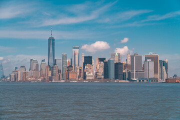 Fototapeta premium New York City skyline. Skyscrapers of Manhattan with blue sky