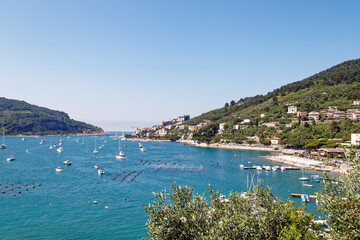 Fototapeta na wymiar Portovenere, Liguria, Italy - June 26, 2021: summer view of the Portovenere village and its harbour