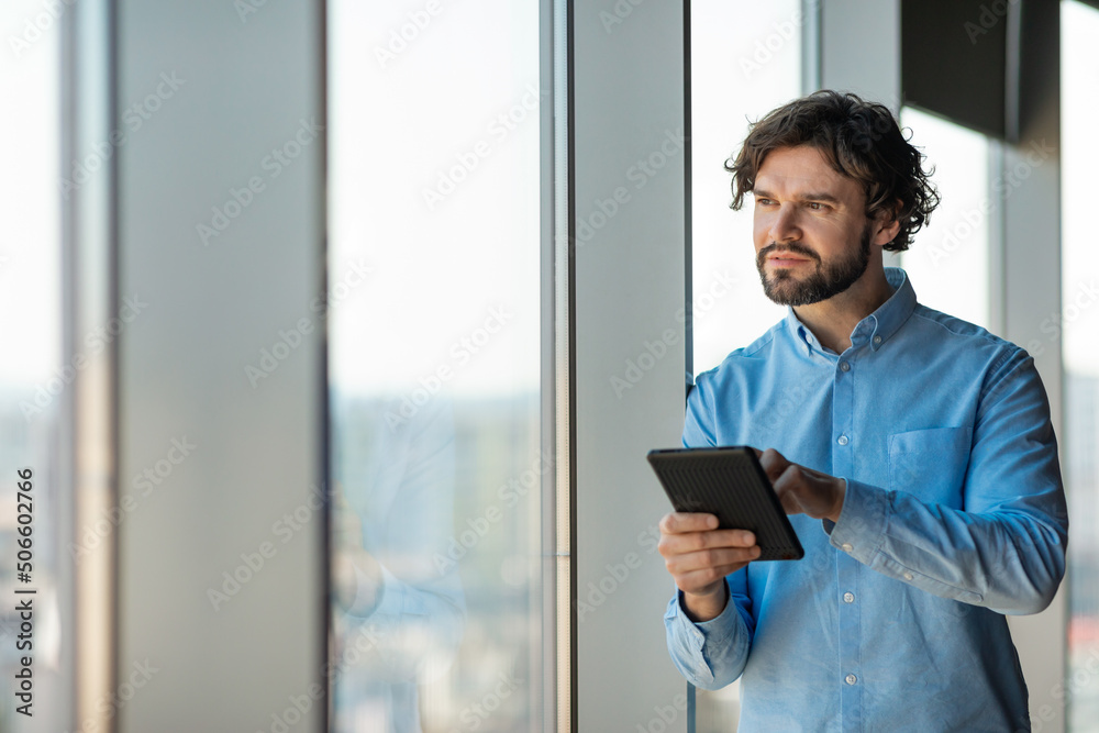 Aufkleber portrait of man using digital tablet at office
