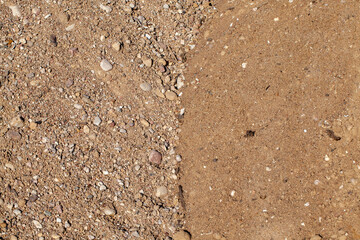 sand with stones on the construction site during the construction