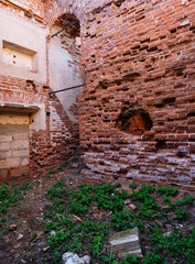 Fototapeta na wymiar Walls of an ancient Russian church. Red brickwork. Architectural monument