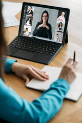 Fototapeta na wymiar Online briefing. Video meeting. Corporate network. Female business team discussing strategy plan working in digital office on laptop screen.