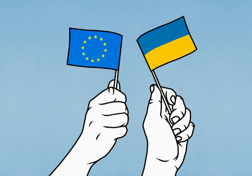 Hands holding European Union and Flag Ukrainian flags
