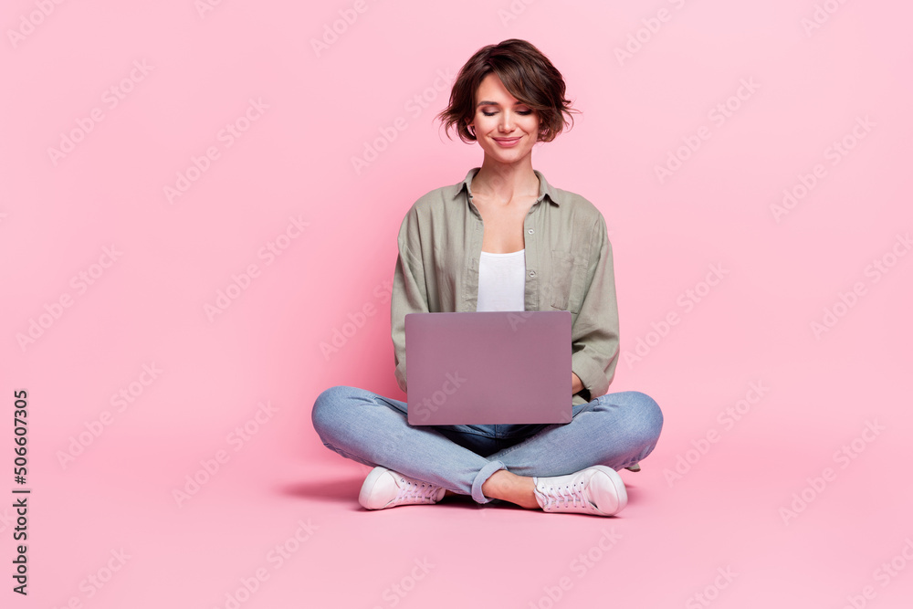 Aufkleber full length portrait of pretty charming girl use wireless netbook chatting isolated on pink color ba
