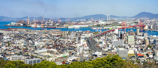 Fototapeta na wymiar 高塔山展望台から、かつて東洋一の吊橋とされた若戸大橋（福岡県北九州市）