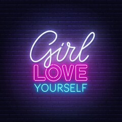 Girl Love Yourself neon quote on a brick wall.