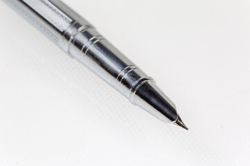 Nib of modern fountain pen close-up in selective focus