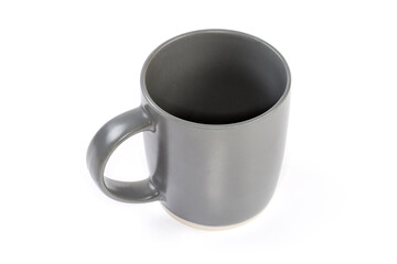 Empty gray cup with handle on a white background
