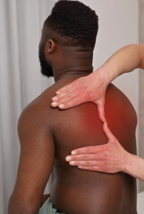 Obraz premium Back Pain Relief Using Chiropractic Care. Physiotherapy, sport injury rehabilitation concept