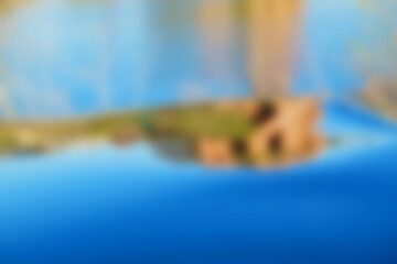 Abstract blue blur and defocused reflection background