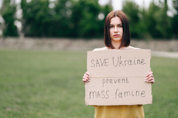 Sad-faced girl asks world for help to save Ukraine to stop mass famine