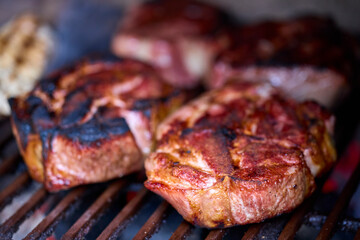 various pieces of grilled meat, grilled food.