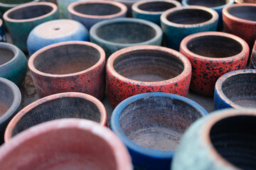 Multicolored old empty clay pots. Decorative ornament of ancient potter