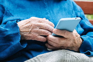 Mobile Apps for Seniors and the Elderly. Application for elderly adults. Mature senior woman,...