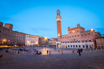 views of piazza del campo with mangia tower at background - obrazy, fototapety, plakaty