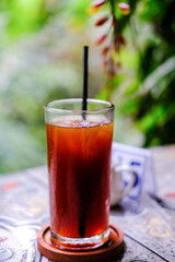 Americano in tropical coffee shop