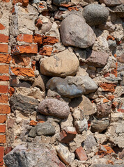 a part of the wall of a building made of bricks