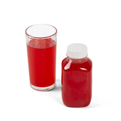 Red drink juice in a glass glass and in a transparent plastic bottle with a black cap isolated without background