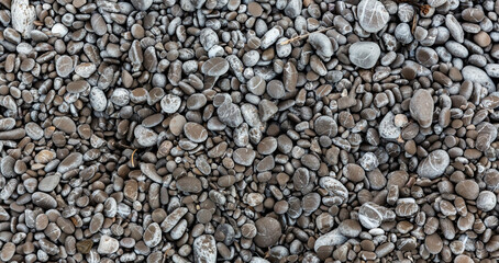 Coll Baix beach of small round, oval and polished stones. Majorca, Alcudia