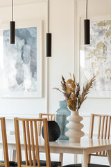 Simple dining table with stylish decorations
