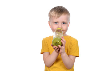 cut boy drinking fresh fruit juice