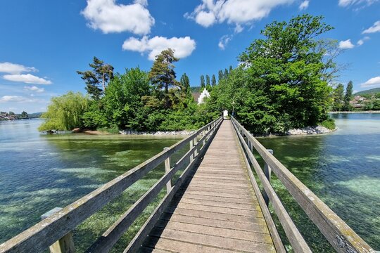 Wooden bridge over the Rhine River to monastery island of Werd near Stein am Rhein, Eschenz, Canton Thurgau, Switzerland