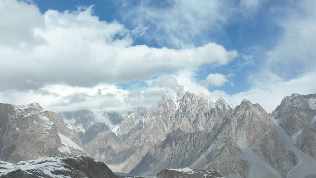 Timelapse Of Clouds Rolling Over Epic Passu Cones In the Karakoram Range. Locked Off