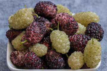 Red and white mulberry berries