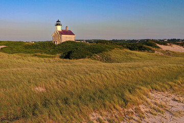 Fototapeta na wymiar Amazing late afternoon summer aerial photo of the North Lighthouse on Block Island, Rhode Island.