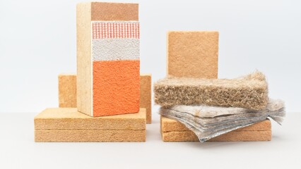 wooden and mineral fibers industrial thermal insulation materials - energy saving concept - obrazy, fototapety, plakaty