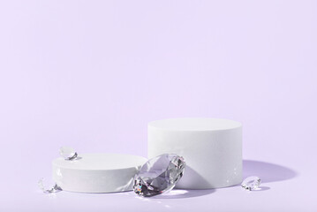 White podium with diamonds on a lilac background.