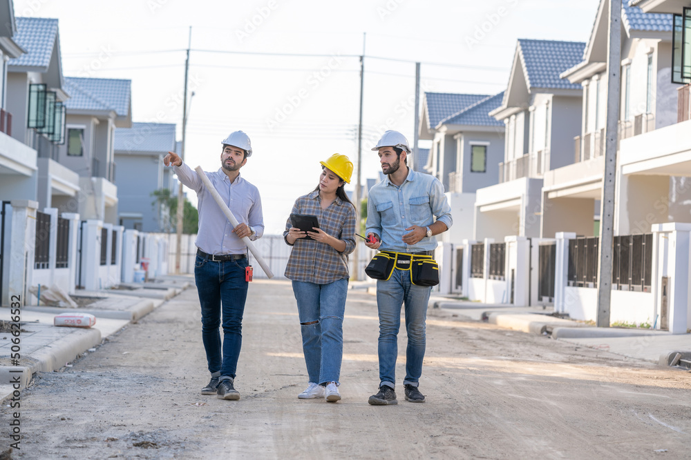 Aufkleber engineer with foreman working on his blueprints with documents on construction site,meeting,discussi