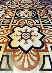 Marble pavement mosaic of the Cathedral of Milan (Duomo de Milano). Lombardy, Italy