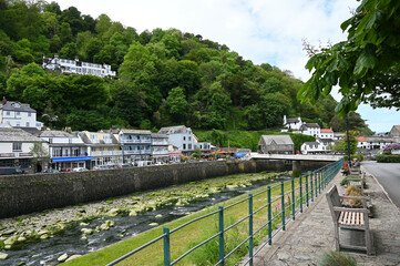 20 May 2022: Lynmouth, Devon, England, UK - A view of the River Lyn and Mars Hill on a sunny day.  Coastal village of Lynmouth in Devon on the northern edge of Exmoor National Park.