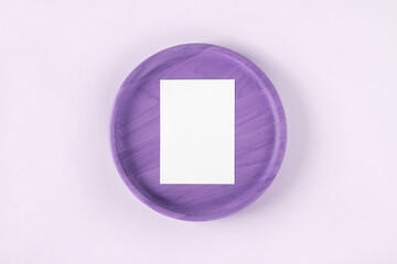 Blank paper sheet on wooden plate pastel violet background. Card mockup. Elegant wedding layout. Bouquet of dried flowers pampas grass. Minimal eco template Soft shadow. Aesthetic interior. White page