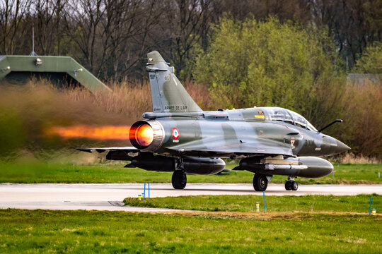 French Air Force Dassault Mirage 2000 Fighter Jet Plane Afterburner Take-off From Leeuwarden Airbase. 