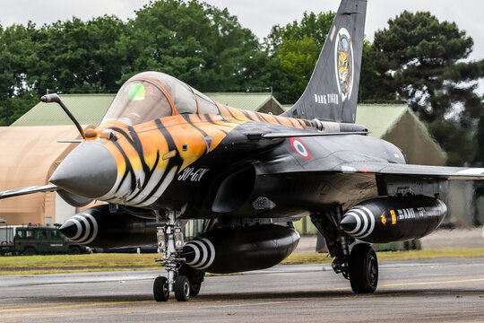 Special painted French Air Force Dassault Rafale fighter jet plane taxiing to the runway during the NATO Tigermeet. Mont-de-Marsan, France.