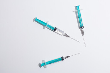 Medical syringe on a white background. A syringe for injection. The concept of health and beauty