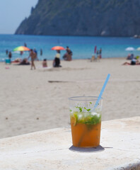 Mojito on the beach, refreshing drink, vacation at sea.