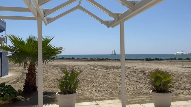 View on sea and yacht from beach in Anzio, Italy